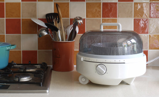 Illustration for article titled This Compact Microwave Is a Must-Have For Your Car